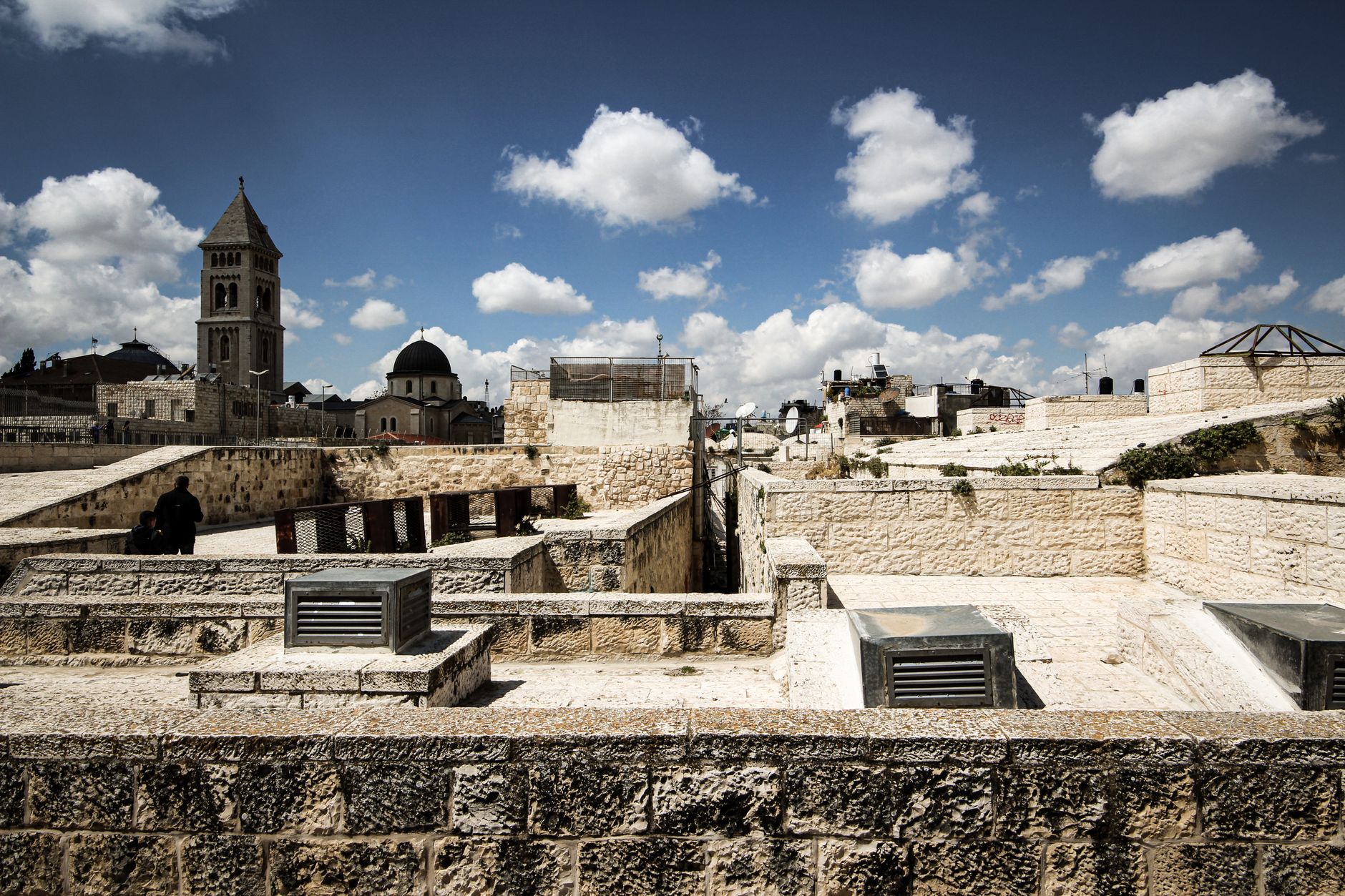 Ancient stone walls of Jerusalem’s Old City glowing in warm afternoon light