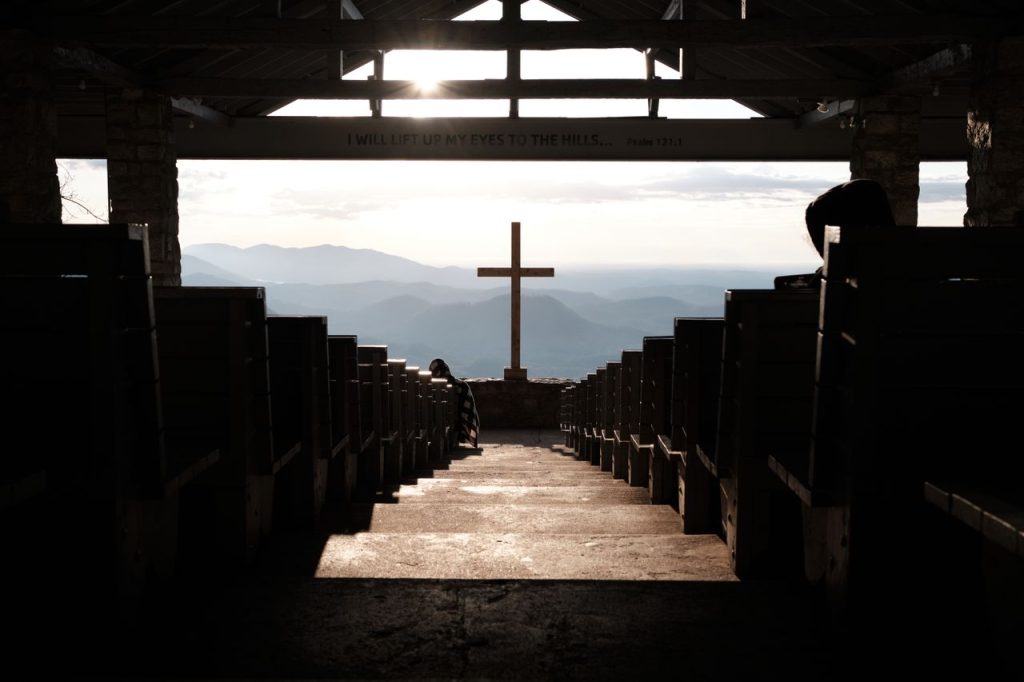 A peaceful church interior at sunset, reflecting the heart behind our ministry travel giving program.