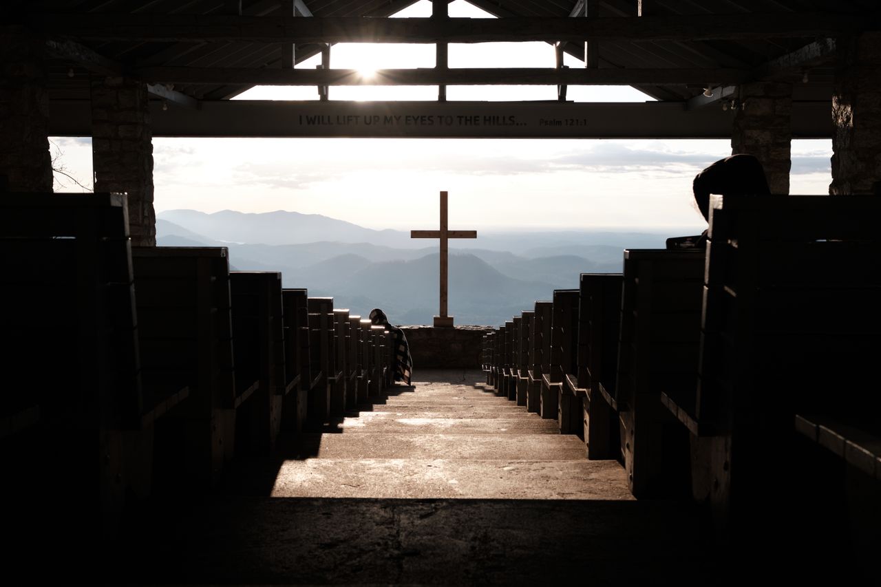 A peaceful church interior at sunset, reflecting the heart behind our ministry travel giving program.